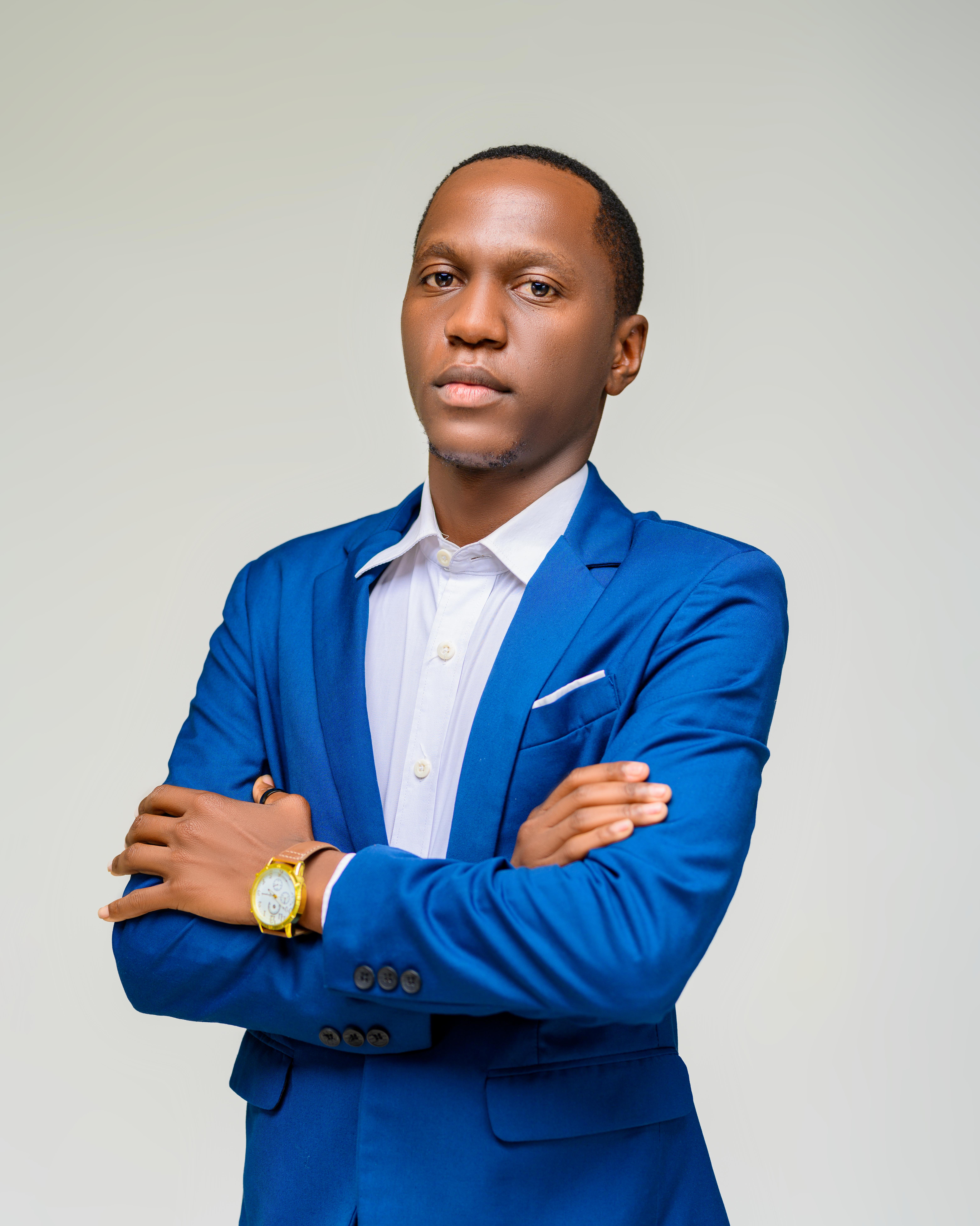 Ernest Mbalasiya Clarix, Program Manager at YOSESO, managing environmental projects